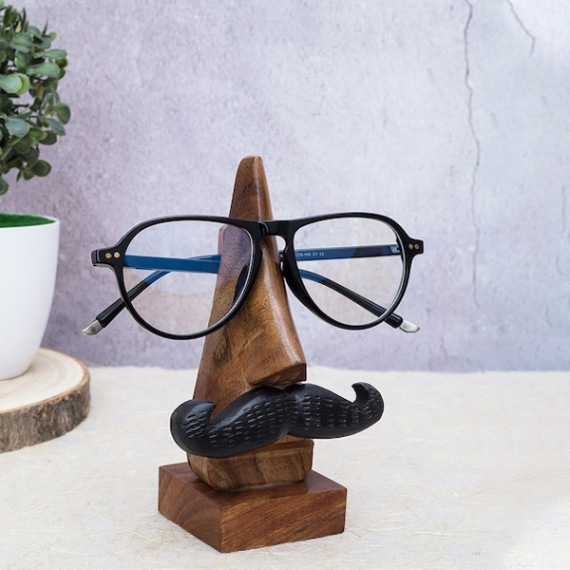 https://fazhionshore.com/products/brown-handcrafted-eyeglass-holder-showpiece